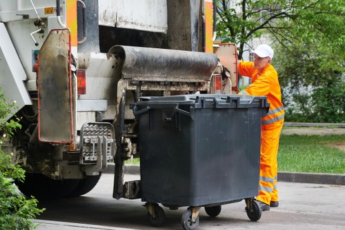Construction site in Golders Green with a large skip bin managing debris.
